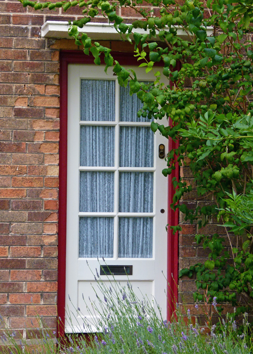 The front door at Forthlin Road. See the lavender bush? McCartney, Forthlin Road, Mendips
