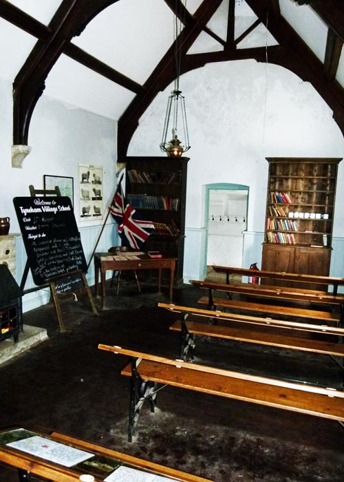 Tyneham - the recreated schoolroom, with work laid out for you to inspect.